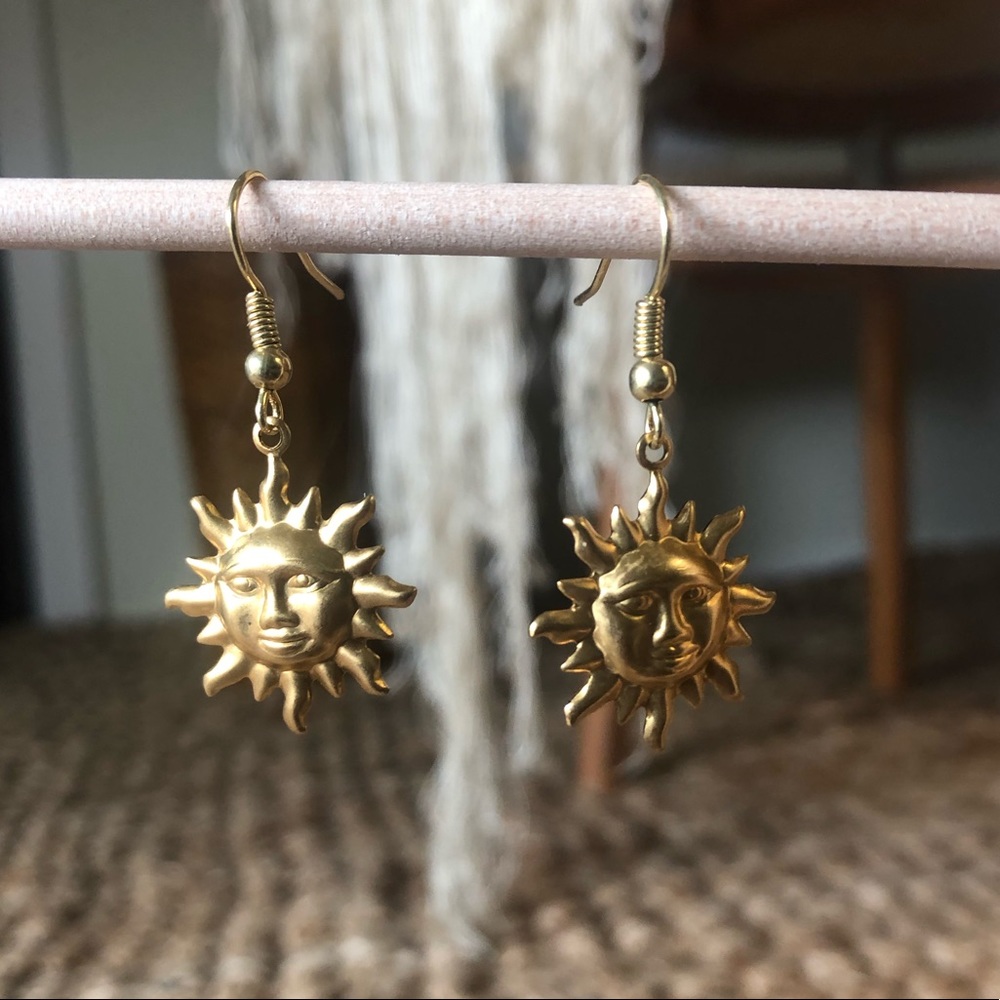 Gold sun earrings